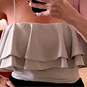 Cute cropped top runs small so perfect for jeans or skirt